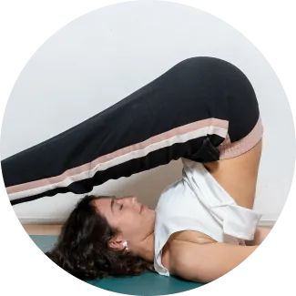 A female is performing yoga asana