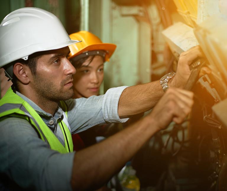 boy-repairing-generator