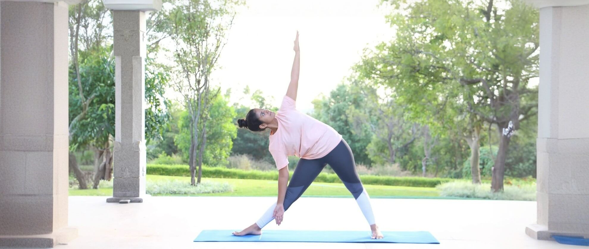 Trikonasana (Triangle Pose) | How to do | Benefits - The Art Of Living