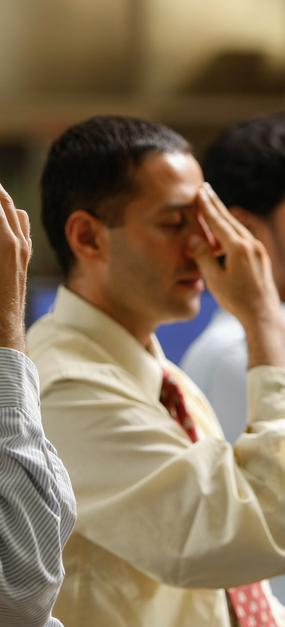 Corporate people doing Nadi Shodan Pranayama