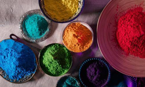 Different colours kept on bowls for playing Holi