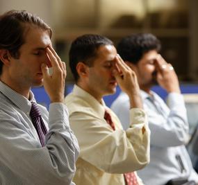 Corporate people doing Nadi Shodan Pranayama