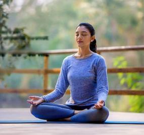 benefits of meditation - girl meditating at blr ashram