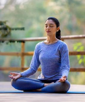 benefits of meditation - girl meditating at blr ashram