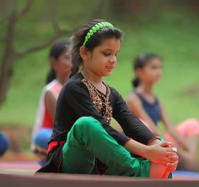 yoga - Causes and Cure of Back Pain in Children