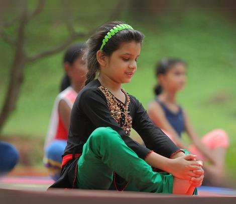 yoga - Causes and Cure of Back Pain in Children