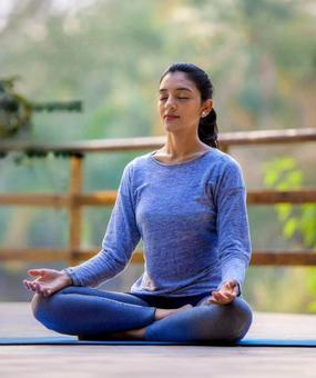 benefits of meditation - girl meditating at blr ashram